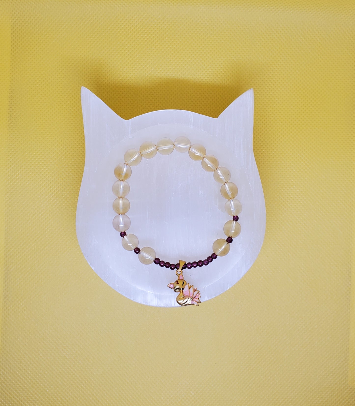 Citrine beads with small garnet beads and charm