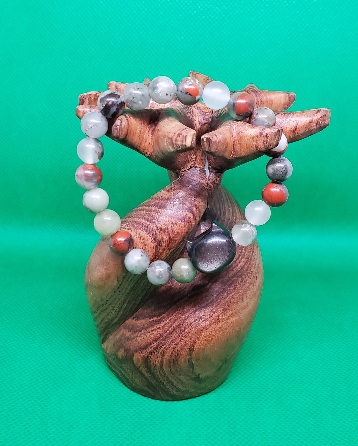 African blood stone bracelet with silver obsidian cat shape spacer