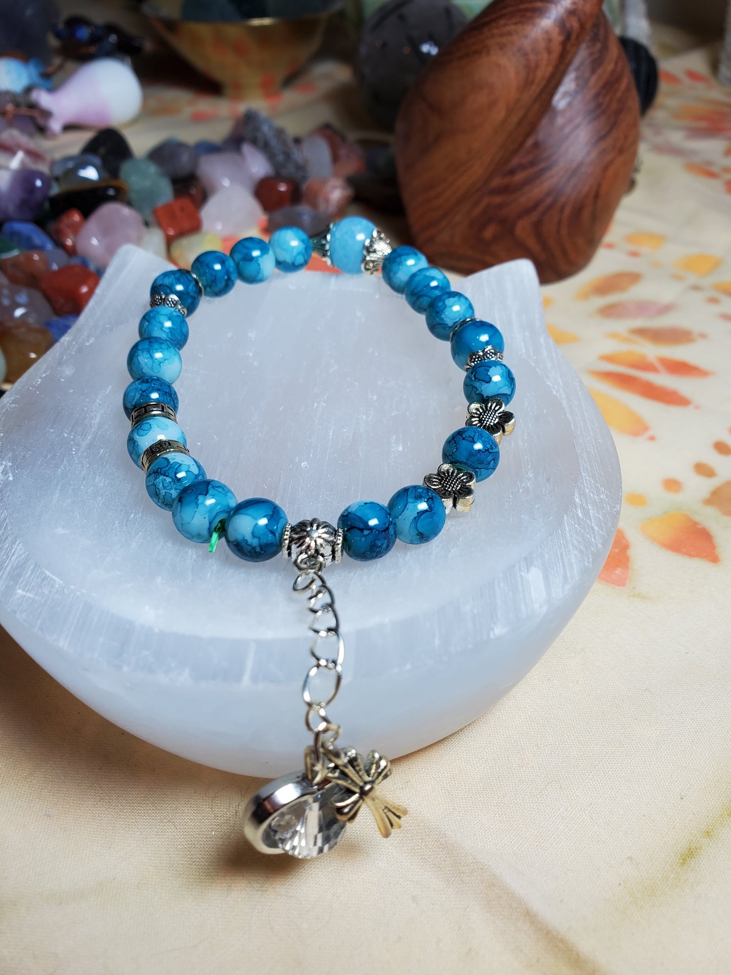 Crystal bead bracelet with charms