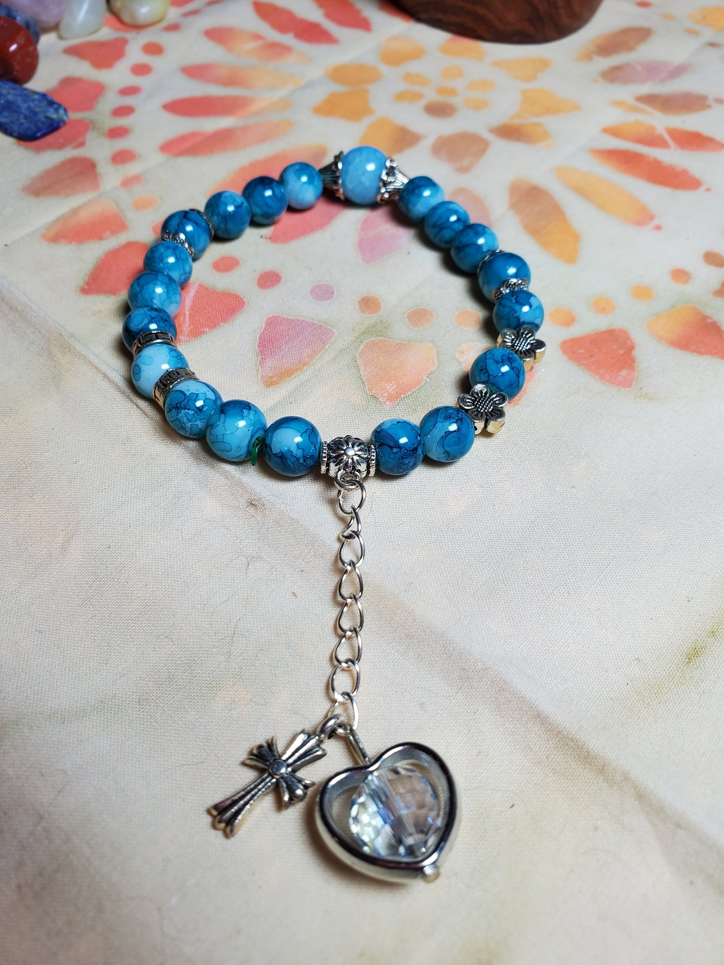 Crystal bead bracelet with charms